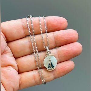 Brand new white gold plated Our Lady necklace
